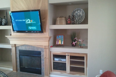 Inspiration for a modern living room remodel in Phoenix with a wall-mounted tv