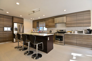 Mid-sized trendy l-shaped porcelain tile enclosed kitchen photo in New York with flat-panel cabinets, dark wood cabinets, quartzite countertops, white backsplash, stainless steel appliances and an island