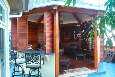 Inspiration for a tropical verandah in Seattle.