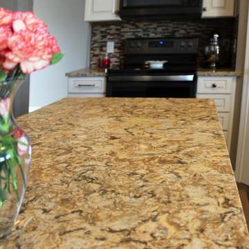 Cream Kitchen with Contrasting Dark Island with Quartz Countertop