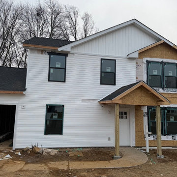 Wood composite and vinyl siding exterior