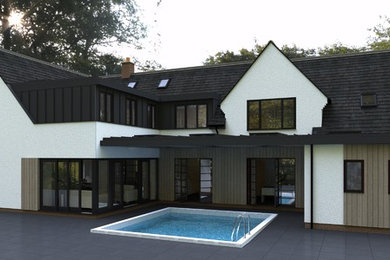 Inspiration for a large and white contemporary two floor render detached house in Other with a pitched roof and a mixed material roof.