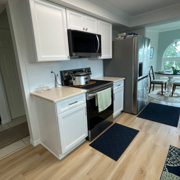 From Dull to Dazzling: Kitchen Cabinets Redone in Arctic White