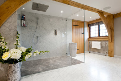 Inspiration for a country bathroom in Kent with an open shower and marble benchtops.