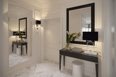 This is an example of a mid-sized traditional foyer in Berlin with marble floors, white walls, a single front door, a white front door and white floor.