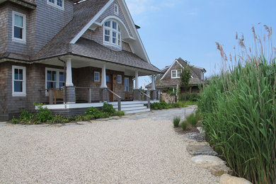 Photo of a large transitional full sun landscaping in New York.