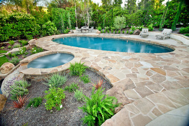 This is an example of a mediterranean round pool in Orange County.