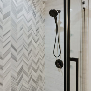 Frameless Glass Shower with Chevron Tile