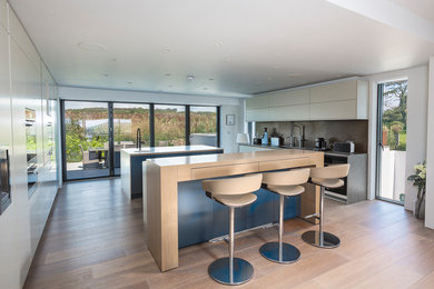 Design ideas for a large contemporary open plan kitchen in Devon.