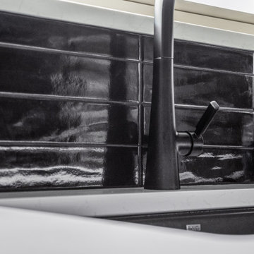 Dark & Moody Cabinets Bring Today’s Design Trends into the Kitchen