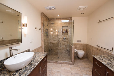 Inspiration for a mid-sized contemporary 3/4 beige tile and porcelain tile porcelain tile and beige floor bathroom remodel in Other with flat-panel cabinets, dark wood cabinets, a wall-mount toilet, beige walls, a vessel sink, quartz countertops and a hinged shower door