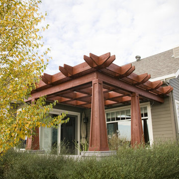 Cottage-Style Rambler--Pergola View