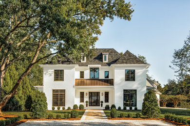 Huge transitional white two-story brick exterior home idea in Charlotte