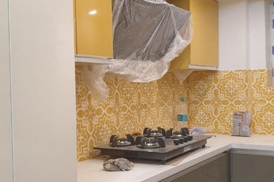 バンガロールにあるコンテンポラリースタイルのおしゃれなキッチンの写真