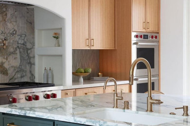 Minimalist kitchen photo in Los Angeles with marble countertops, green backsplash, marble backsplash and green countertops