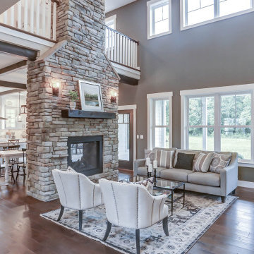 Windows on both levels bring in the light in living room