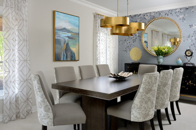 Example of a mid-sized transitional carpeted kitchen/dining room combo design in Toronto with beige walls and no fireplace