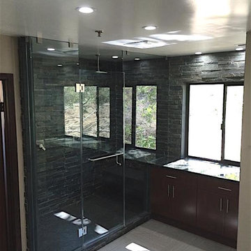 Black Stone and Dark Cabinets - Bathroom Remodeling