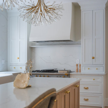 Château Charm: French-Inspired Kitchen Renovation with Plaster Hood Blue Stove a