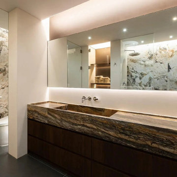 Brown natural marble wash basin solid wood bathroom cabinet.