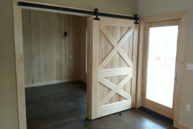 Inspiration for a rustic entryway remodel in San Diego