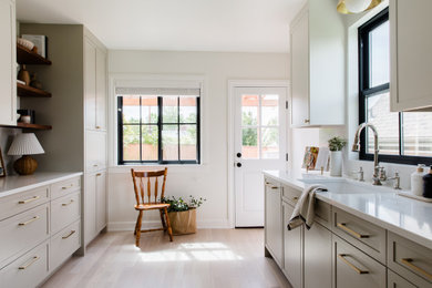 Laundry room - transitional laundry room idea in Seattle