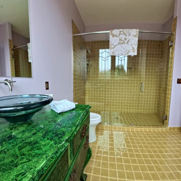 Custom Guest Bathroom with Handcrafted Tile and Artistic Finishes