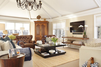 Photo of a large transitional open concept family room in New York with beige walls, carpet, no fireplace and a wall-mounted tv.
