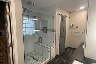 Example of a transitional bathroom design in Miami