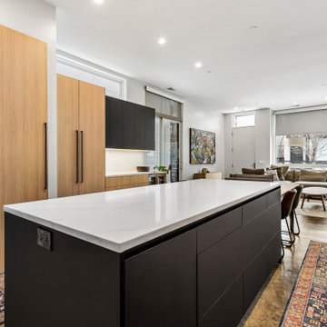 Sophisticated matte black and warm rift cut oak collision