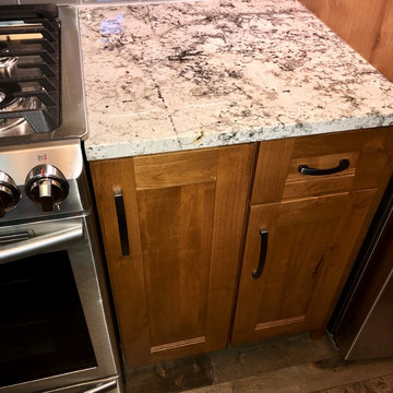 Dura Supreme Cabinets Knotty Alder Butternut Romanix Granite Galley Kitchen