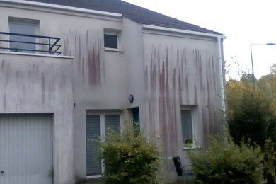 Traitement comtre les algues rouges et contamination sur mur et façade