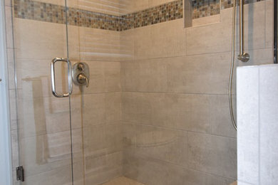 Example of a transitional bathroom design in Other