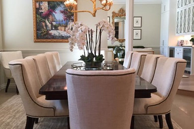 Example of a mid-sized transitional great room design in Austin with beige walls
