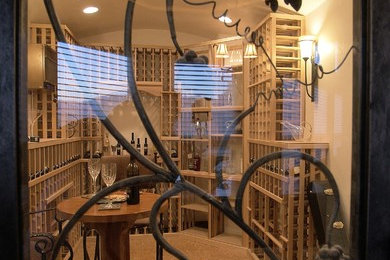Inspiration for a mediterranean wine cellar remodel in Albuquerque