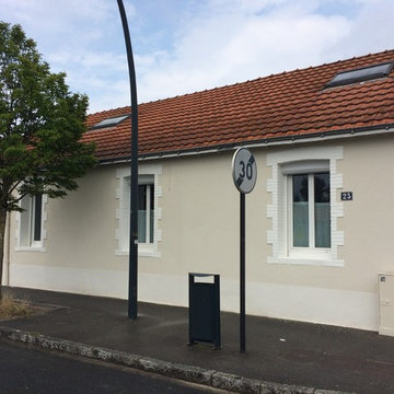 Rénovation de façade d'une ancienne maison ouvrière