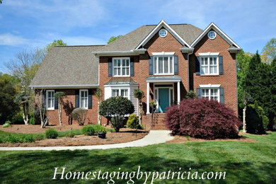 Example of a transitional home design design in Other