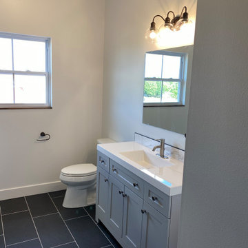 Hall bath with custom painted cabinetry