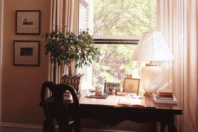 Inspiration for a small timeless freestanding desk dark wood floor home office remodel in Chicago with beige walls