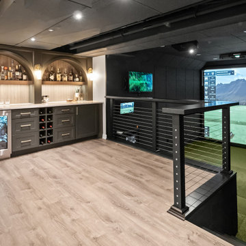 A Basement Built for Entertaining – With a Speakeasy Bar and Golf Simulator