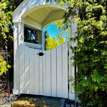 Classic White Garden Gate with Gabled Peaked Roof