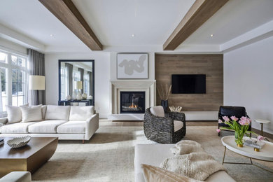 Living room photo with a stone fireplace