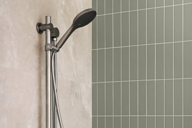 Photo of a mid-sized bathroom in Sydney with a corner tub, an open shower, beige tile, porcelain tile, porcelain floors and a floating vanity.