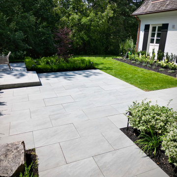Front Entry Patio with Porcelain Tile and Planting