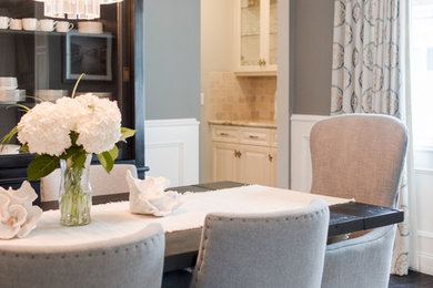 Inspiration for a transitional dining room remodel in Los Angeles with gray walls