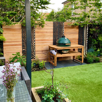 Small contemporary city garden, Living walls  and summer house.