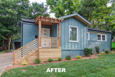 Inspiration for a 1960s home design remodel in Charlotte
