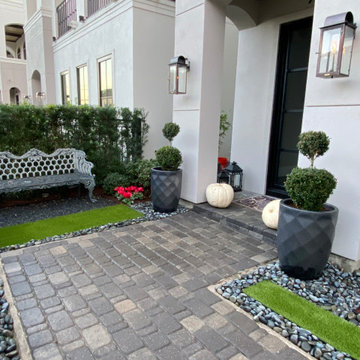 Planter Pots with topiaries to flank the entry