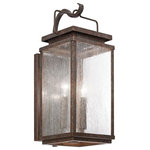 Kichler - Outdoor Wall 2-Light - You'll love the traditional elements of this 2 light outdoor wall fixture from the Manningham collection. The Clear Seedy glass partners with the strong lines and detailed cap accents in Olde Bronze creating a colonial inspired illuminating dream for the outside of your home.
