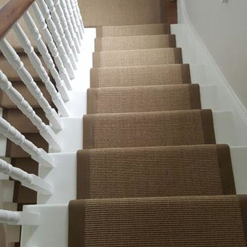 Brown Carpet with Brown Edgings Installed to Stairs